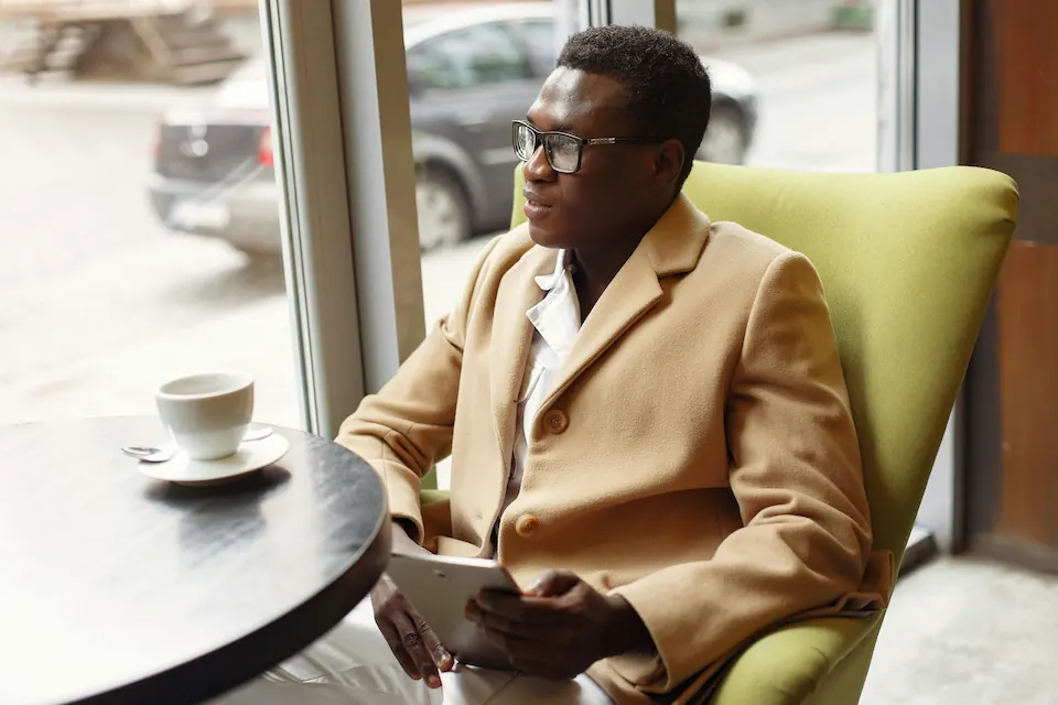 Businessman sitting and reflecting